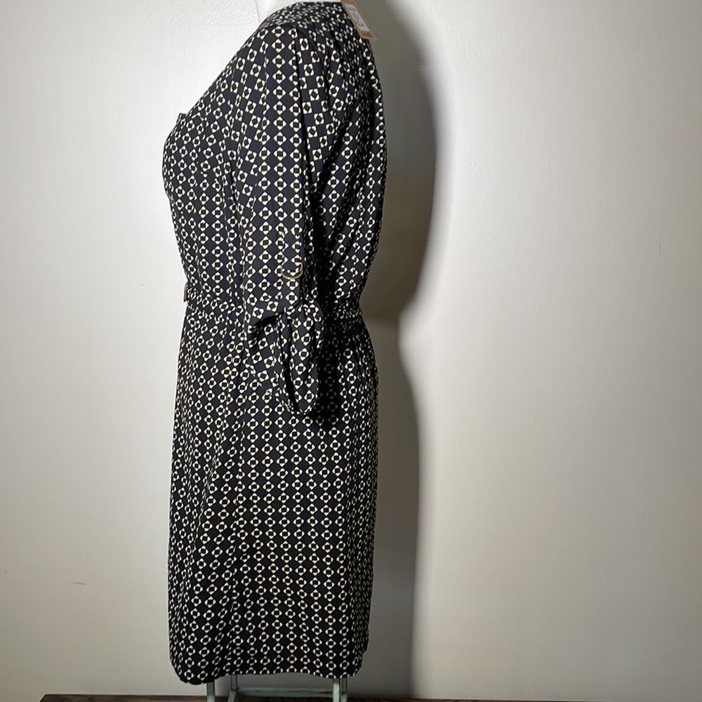 Skies are blue black & beige dress. - Picture 2 of 7